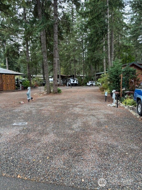 1546 Reservation Road Southeast, Unit 219 Olympia, WA 98513 - Photo 2 of 20 a view of a park with of trees