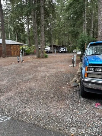 a view of a yard with sitting area