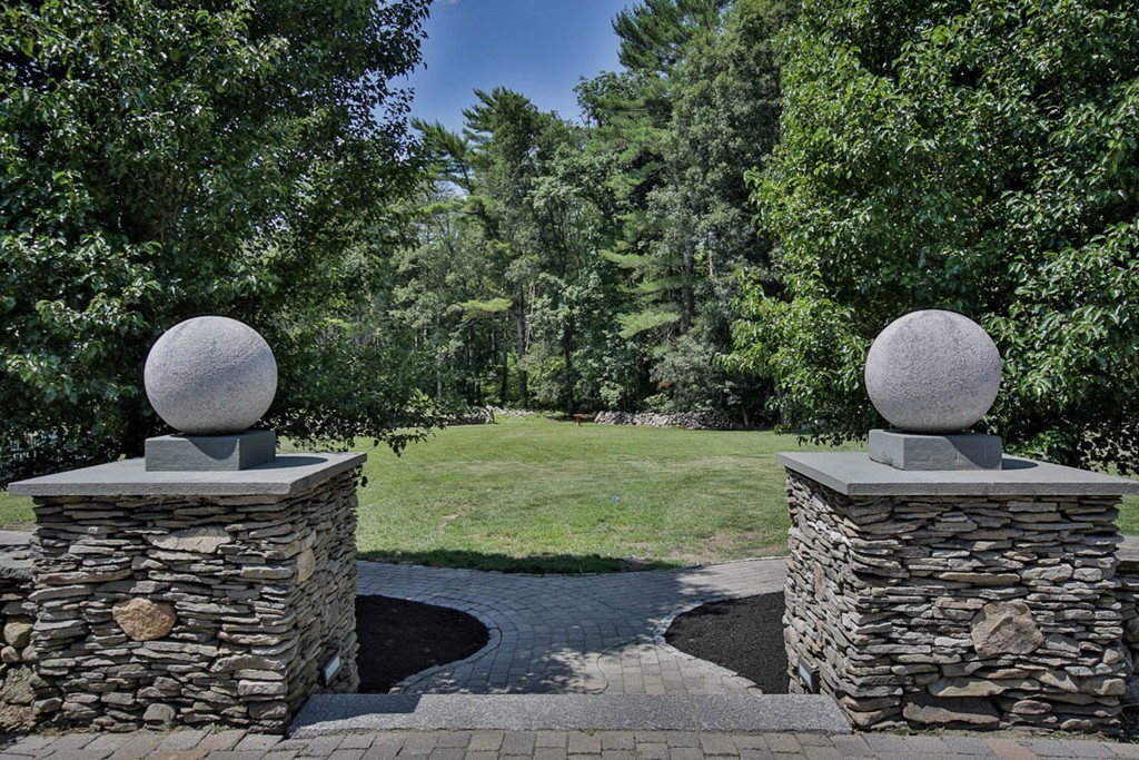 1129 Walnut Plain Road Rochester, MA 02770 - Photo 19 of 29 a front view of a house with garden