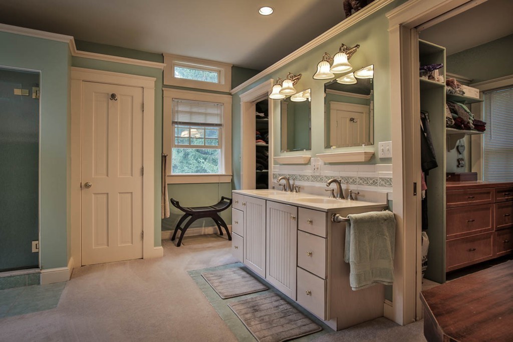 1129 Walnut Plain Road Rochester, MA 02770 - Photo 10 of 29 a bathroom with a granite countertop sink and a mirror