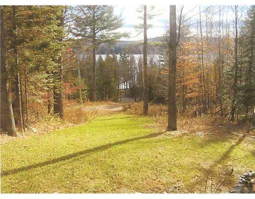 17 Pine Knoll Road Dover-Foxcroft, ME 04426 - Photo 6 of 19 View. View of Lake from Cottage lawn.