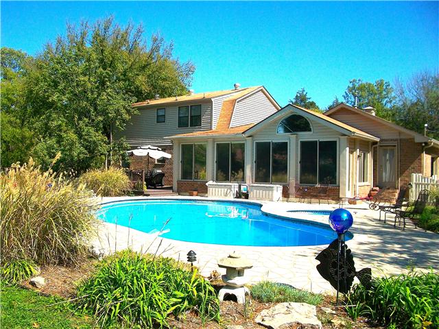 6040 Temple Road Nashville, TN 37221 - Photo 1 of 20 Heated and lighted Pool made of gunite approximately 40,000 gallons. Pool and deck resurfaced in 2008, Re-tiled in 2011, Separate outdoor hot tub, Polaris cleaning system, in ground water supply line to pool/spa custom cover to both