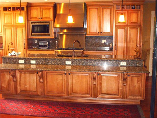 6040 Temple Road Nashville, TN 37221 - Photo 2 of 20 This is entertaining at its finest. Siltstone Rainforest Countertop, custom light fixtures, and plenty of counter space