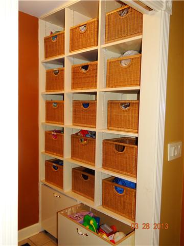 6040 Temple Road Nashville, TN 37221 - Photo 17 of 20 Custom built shelving system with labeled baskets and charging station