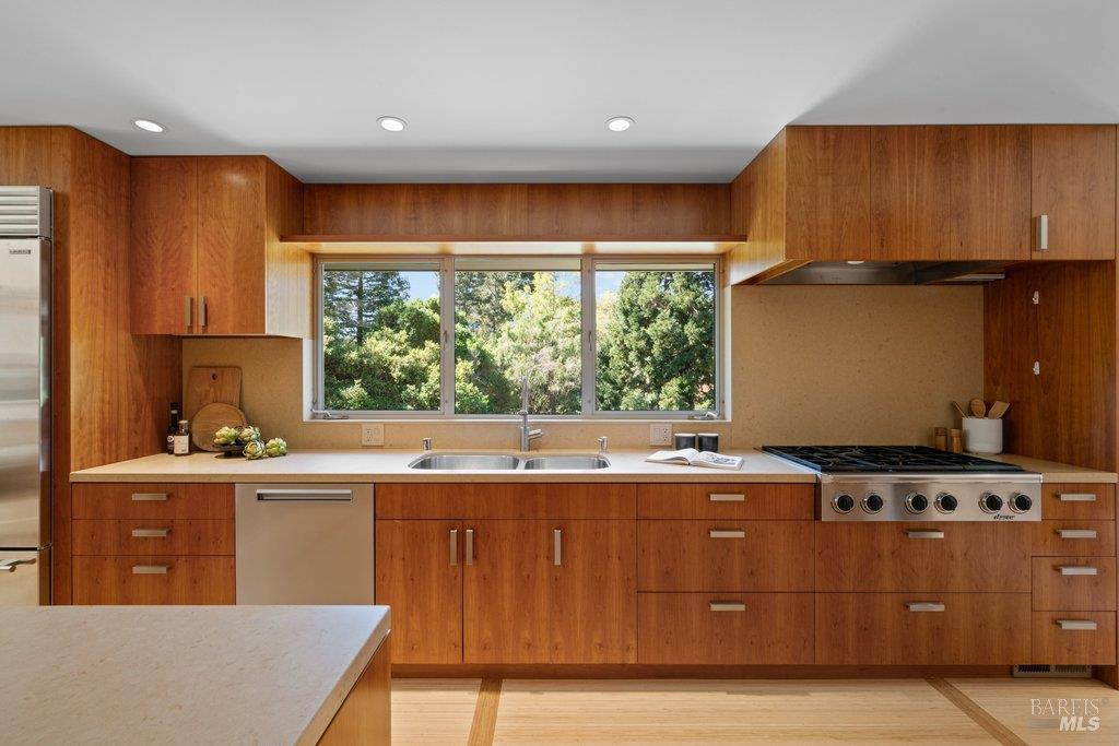103 Reed Ranch Road Tiburon, CA 94920 - Photo 16 of 89 a kitchen with stainless steel appliances granite countertop a stove a sink and a refrigerator