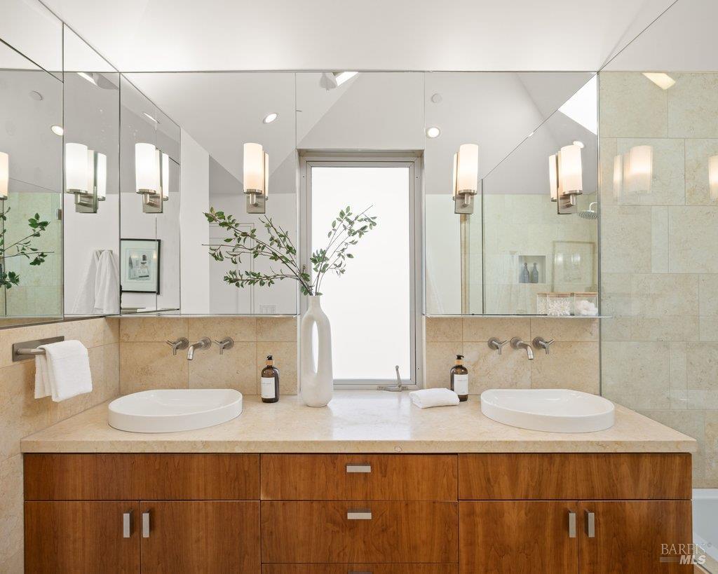 103 Reed Ranch Road Tiburon, CA 94920 - Photo 38 of 89 a bathroom with a double vanity sink mirror and shower