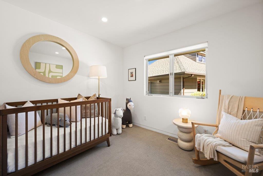 103 Reed Ranch Road Tiburon, CA 94920 - Photo 40 of 89 a living room with furniture and a window