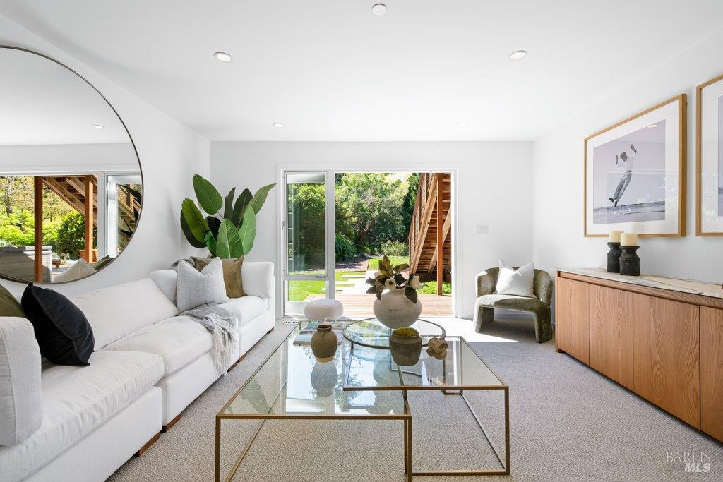 103 Reed Ranch Road Tiburon, CA 94920 - Photo 43 of 89 a living room with furniture and a large window