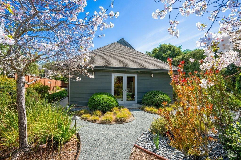 103 Reed Ranch Road Tiburon, CA 94920 - Photo 54 of 89 Detached, two story ADU with full kitchen, living room, and dining area. Upstairs: 1 bedroom, 1 full bath with walk in closet.