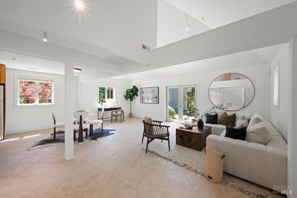 103 Reed Ranch Road Tiburon, CA 94920 - Photo 57 of 89 a living room with furniture and a large window