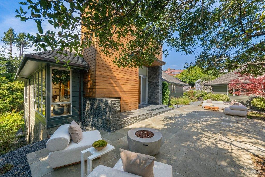 103 Reed Ranch Road Tiburon, CA 94920 - Photo 9 of 89 a view of backyard of house with seating space