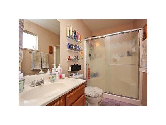 4336 North Sauter Drive East Prescott Valley, AZ 86314 - Photo 12 of 19 a bathroom with sink mirror and shower