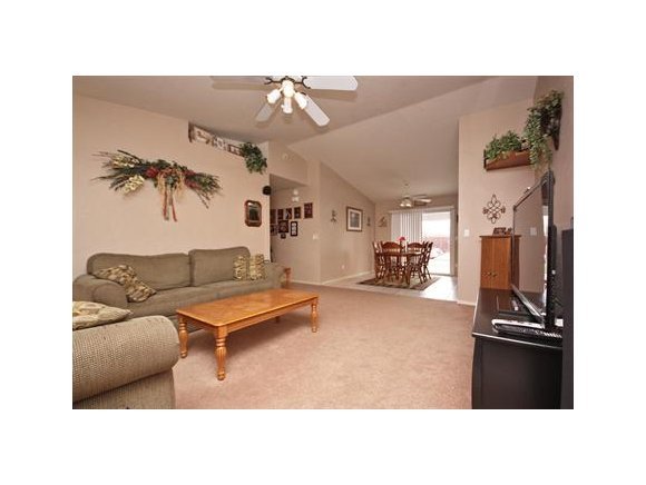 4336 North Sauter Drive East Prescott Valley, AZ 86314 - Photo 2 of 19 a living room with furniture and a flat screen tv