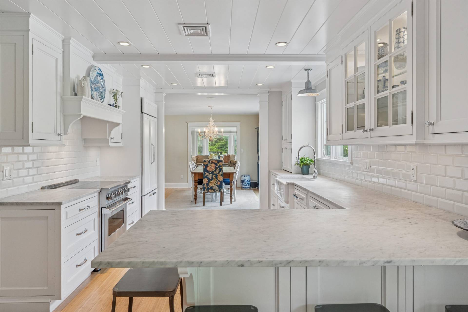 29 Bridle Path Remsenburg, NY 11960 - Photo 12 of 33 a kitchen with stainless steel appliances granite countertop a sink and cabinets