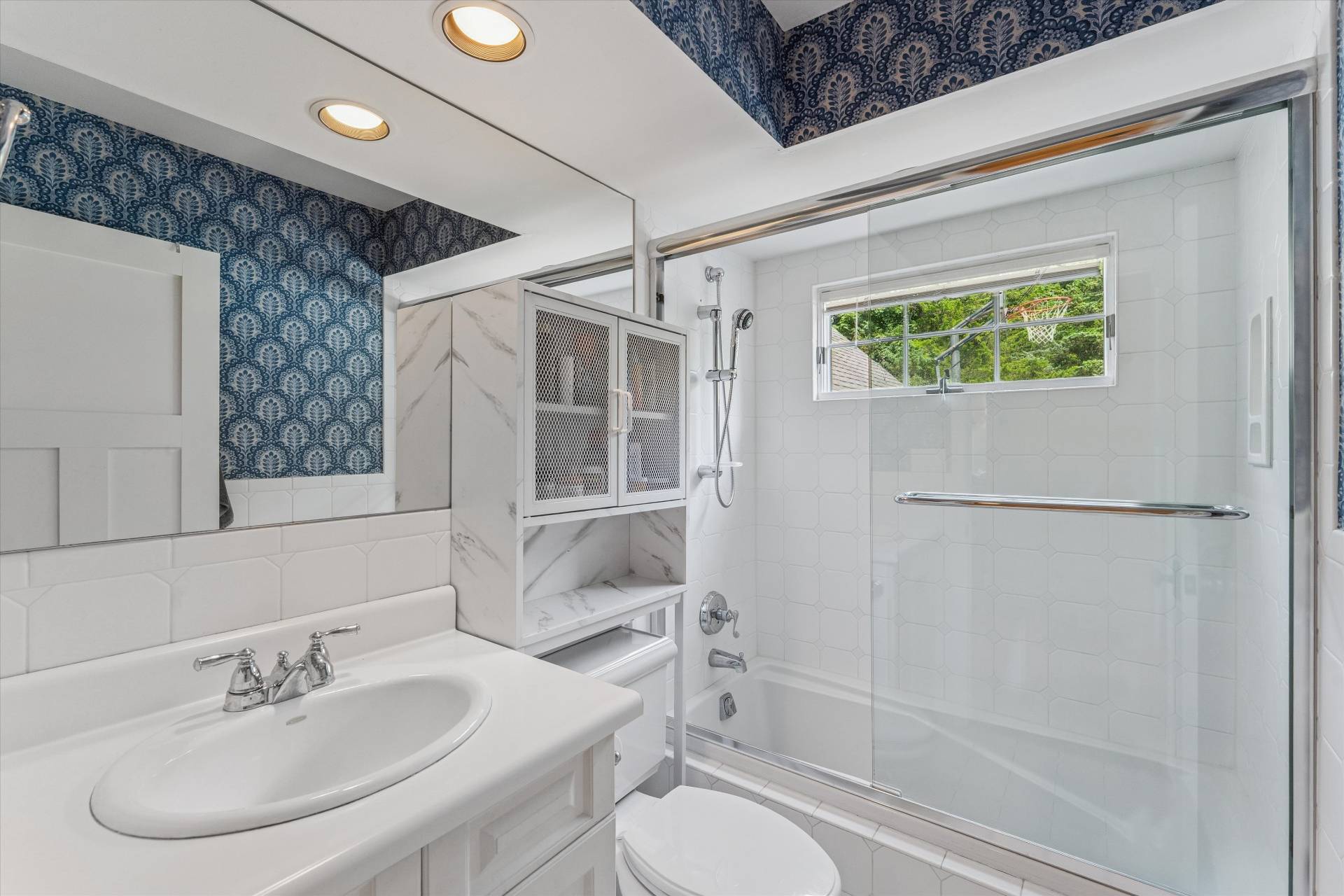 29 Bridle Path Remsenburg, NY 11960 - Photo 15 of 33 a bathroom with a sink toilet and shower