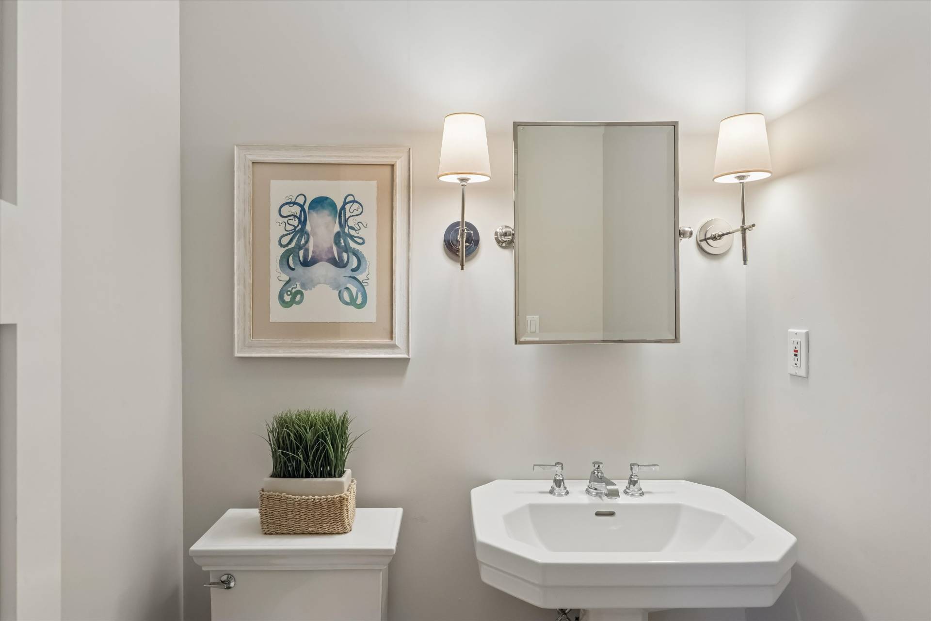 29 Bridle Path Remsenburg, NY 11960 - Photo 17 of 33 a bathroom with a toilet a sink and mirror