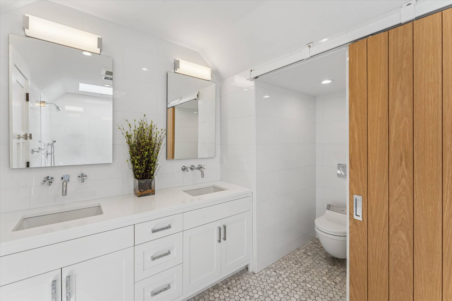 29 Bridle Path Remsenburg, NY 11960 - Photo 19 of 33 a bathroom with a double vanity sink toilet and shower