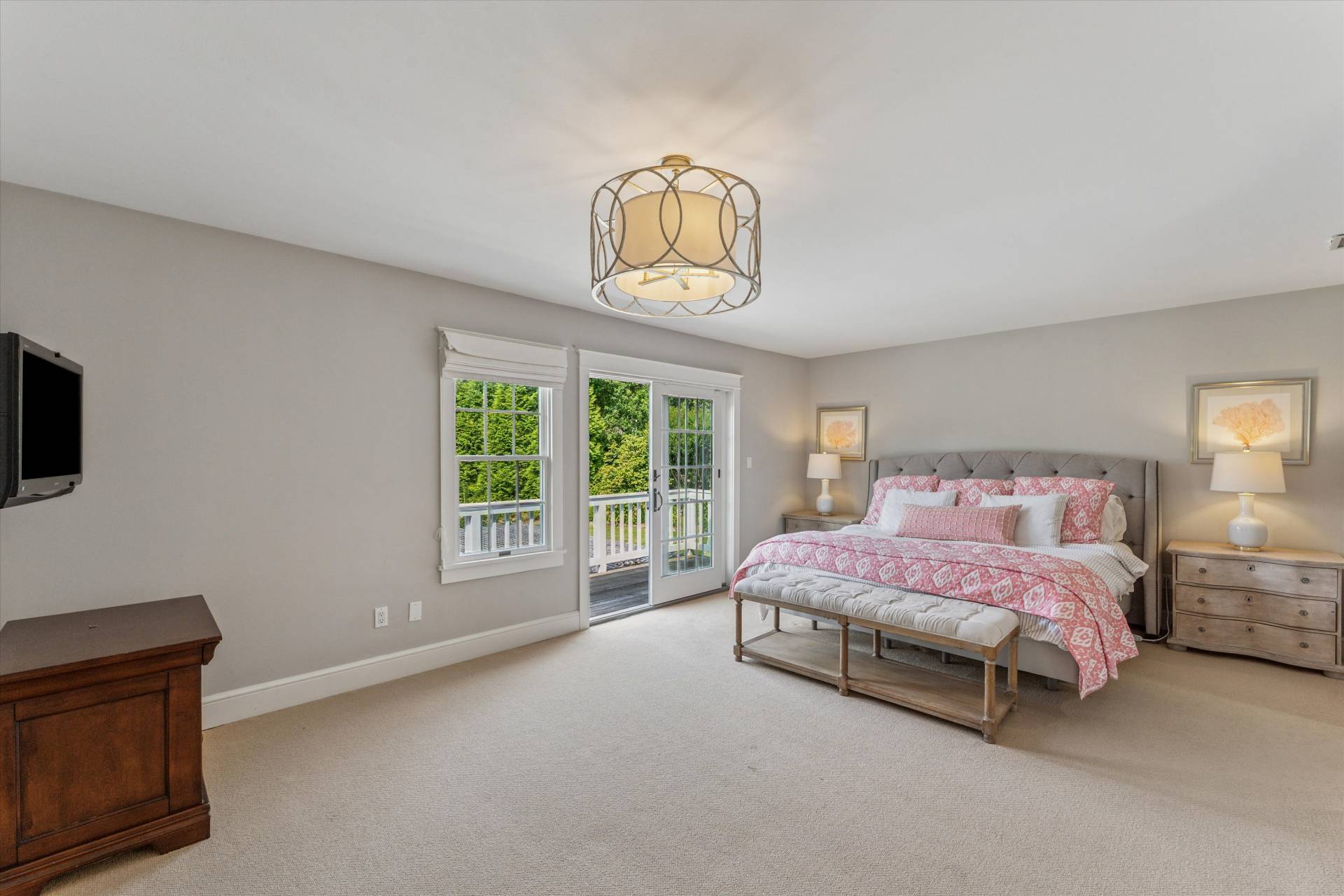 29 Bridle Path Remsenburg, NY 11960 - Photo 20 of 33 a spacious bedroom with a bed and window