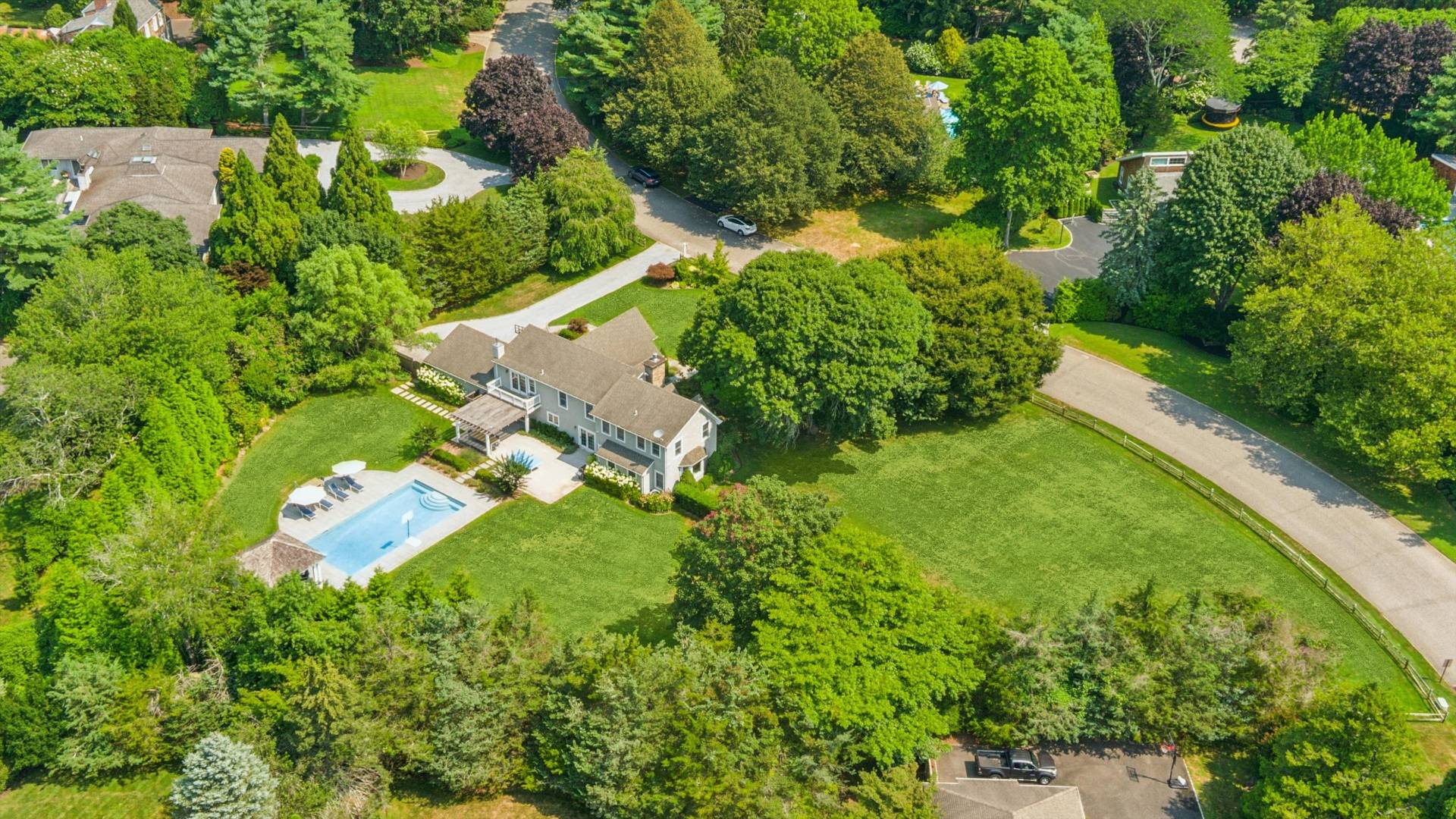 29 Bridle Path Remsenburg, NY 11960 - Photo 26 of 33 an aerial view of residential houses with outdoor space and trees
