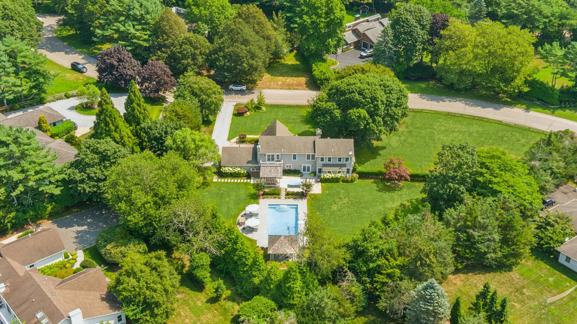 29 Bridle Path Remsenburg, NY 11960 - Photo 27 of 33 an aerial view of a house with a yard basket ball court and outdoor seating