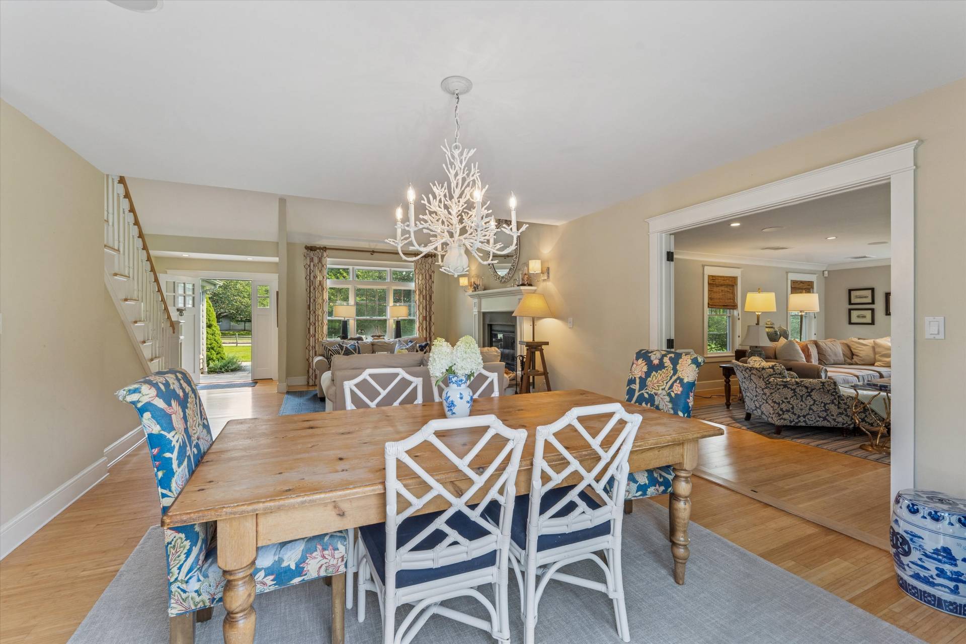 29 Bridle Path Remsenburg, NY 11960 - Photo 10 of 33 a view of a dining room with furniture and a chandelier