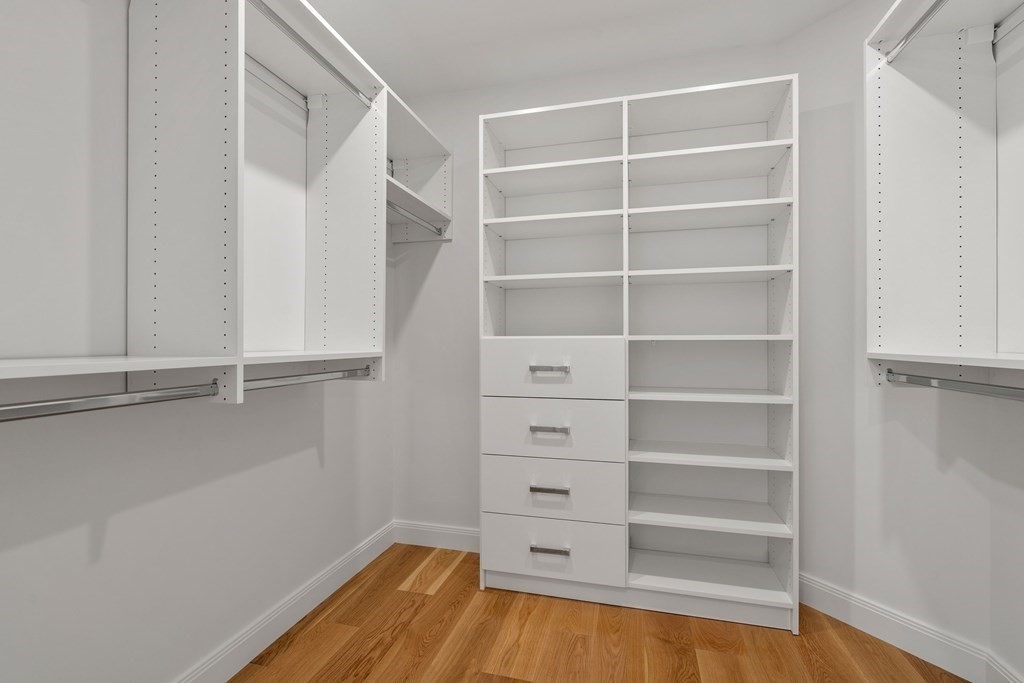 400 Hunnewell Street, Unit 103 Needham, MA 02494 - Photo 13 of 20 a view of walk in closet with empty racks