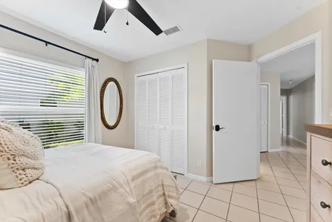 a work room with furniture and windows