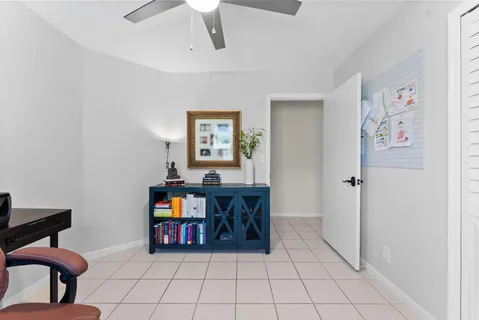 a view of storage and utility room with washer and dryer