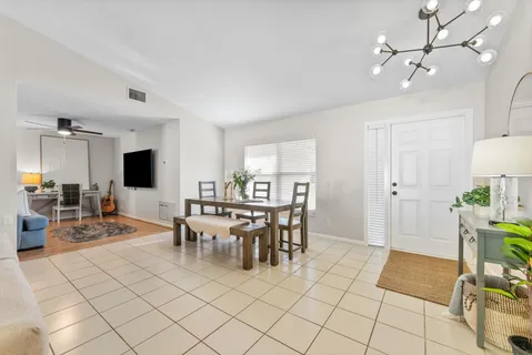 a view of a dining room with furniture