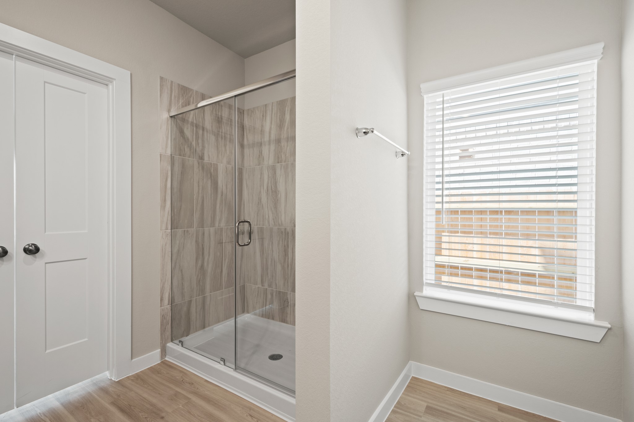 21667 Wave Holw Drive Cypress, TX 77433 - Photo 14 of 27 a bathroom with a shower