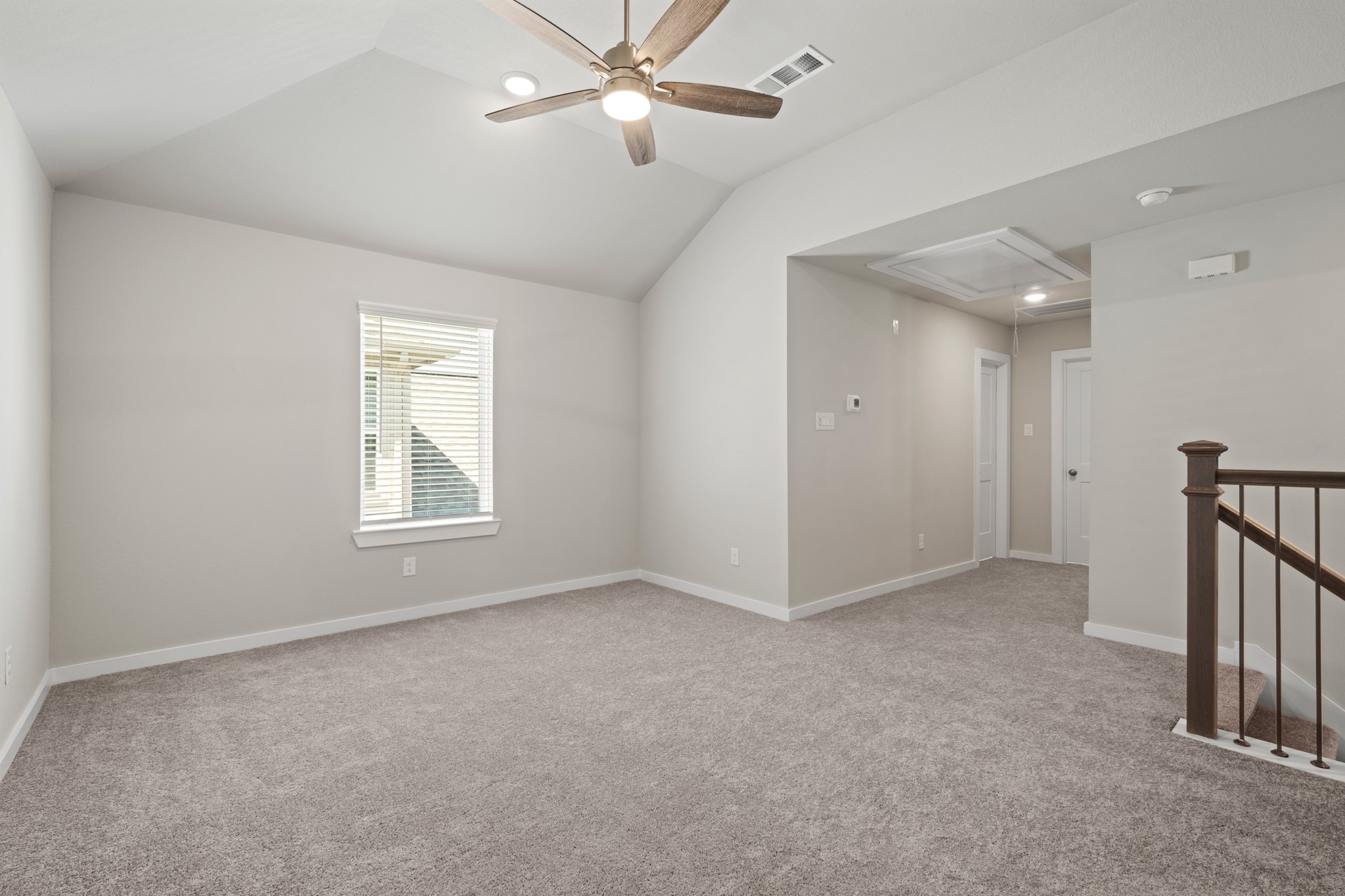 21667 Wave Holw Drive Cypress, TX 77433 - Photo 17 of 27 a view of an empty room with a window