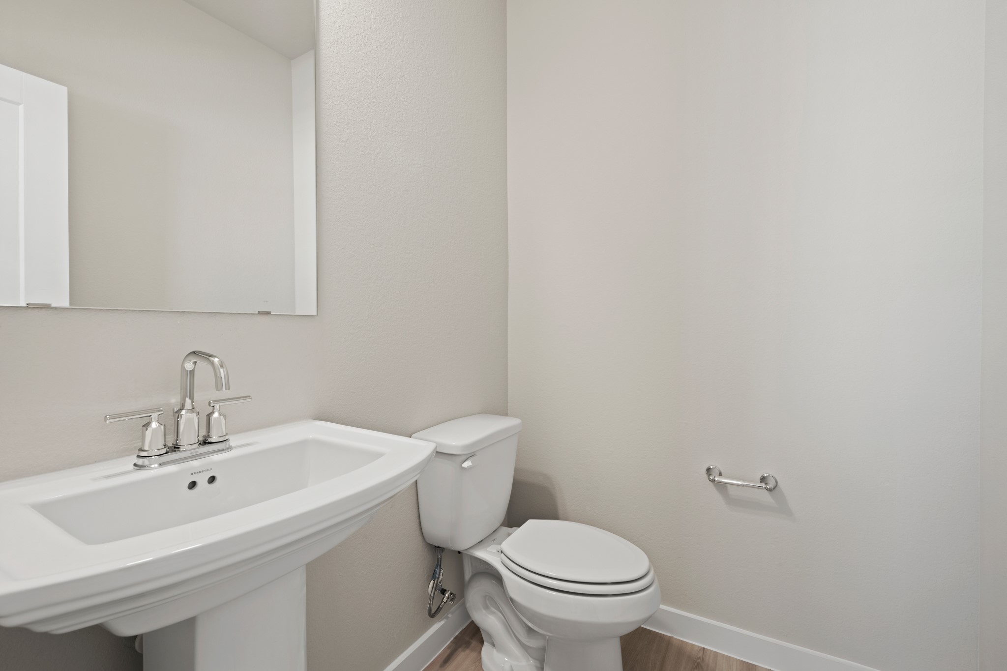 21667 Wave Holw Drive Cypress, TX 77433 - Photo 23 of 27 a bathroom with a sink and a toilet