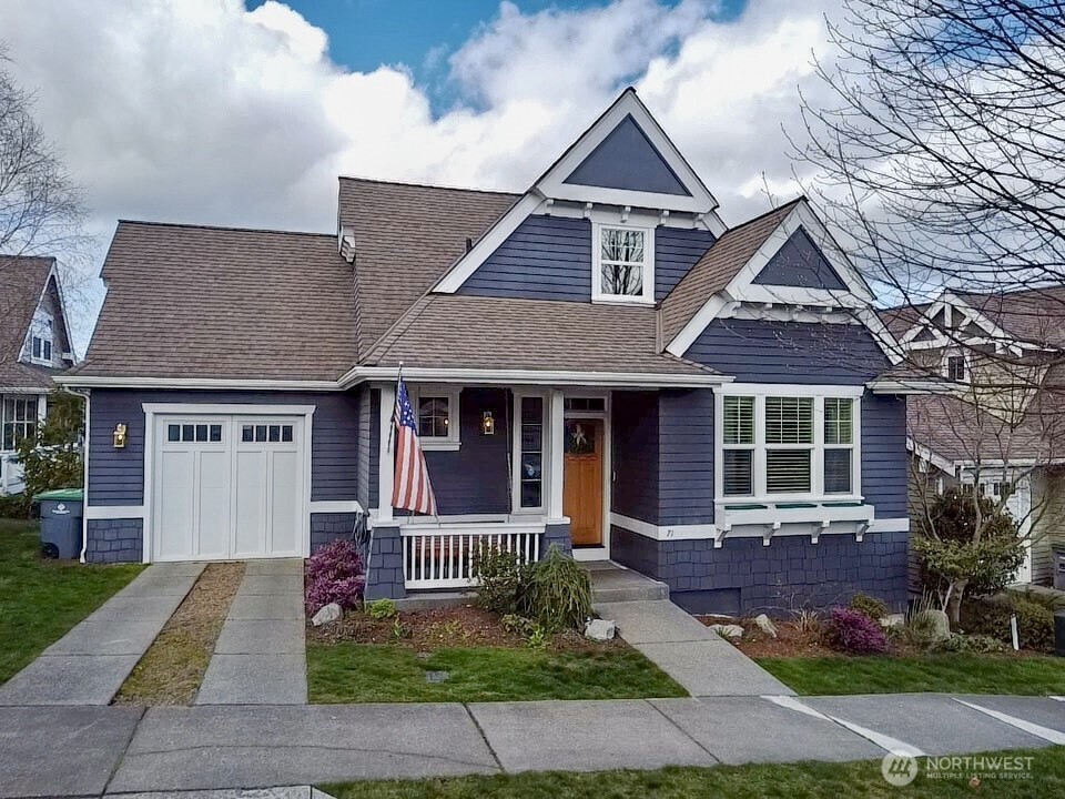 front view of a house with a yard