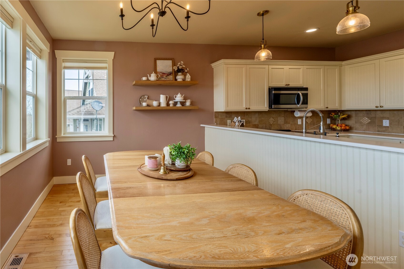 71 Craftsman Court Sequim, WA 98382 - Photo 12 of 33 a kitchen with stainless steel appliances granite countertop a sink a stove and a wooden floors