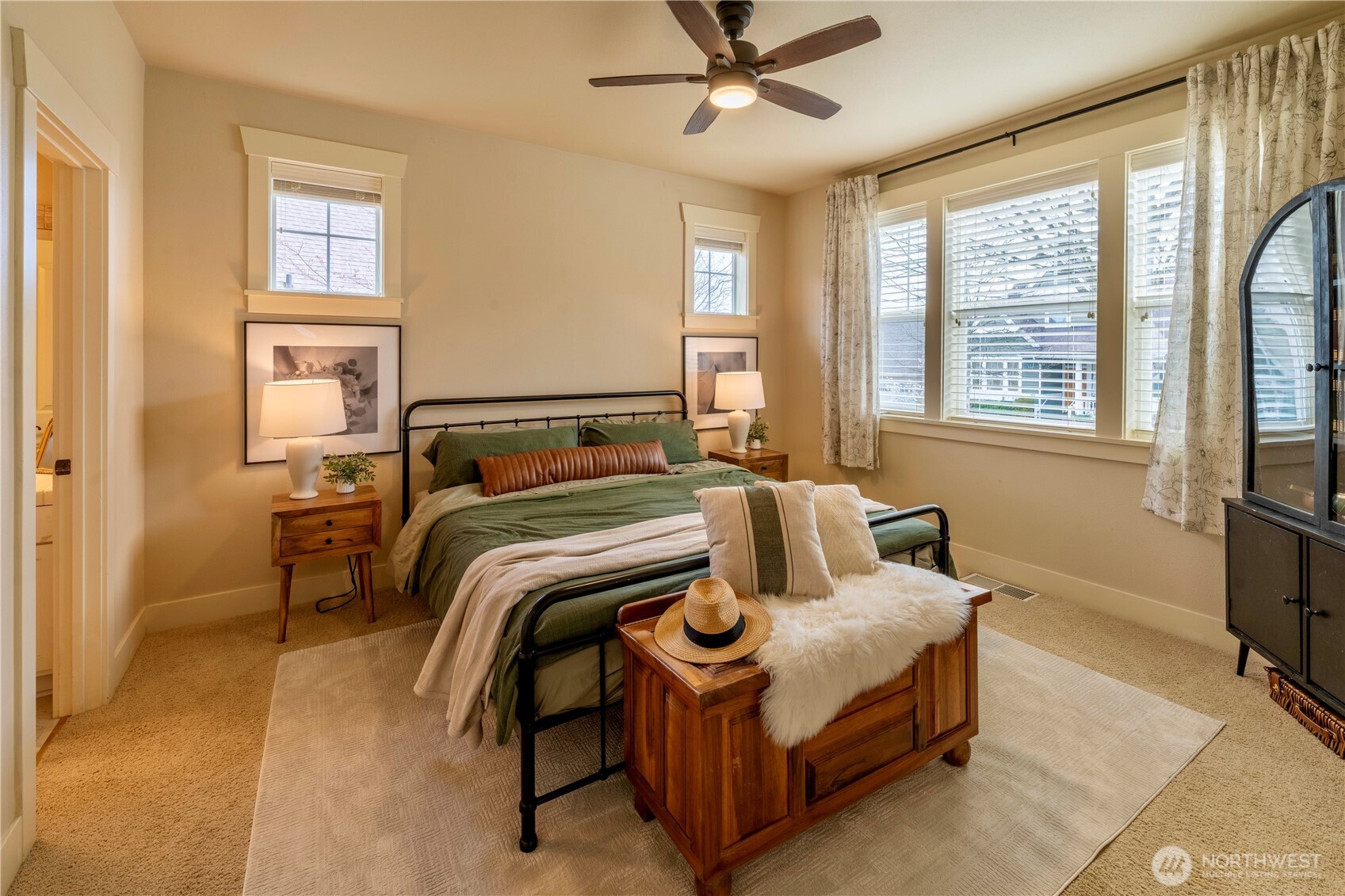 71 Craftsman Court Sequim, WA 98382 - Photo 16 of 33 a bedroom with a bed and wooden floor