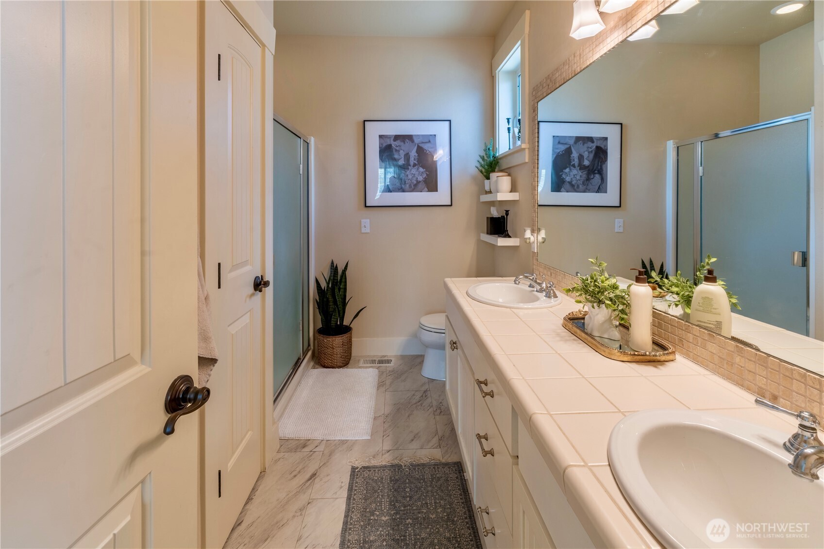 71 Craftsman Court Sequim, WA 98382 - Photo 17 of 33 a bathroom with a sink and a mirror