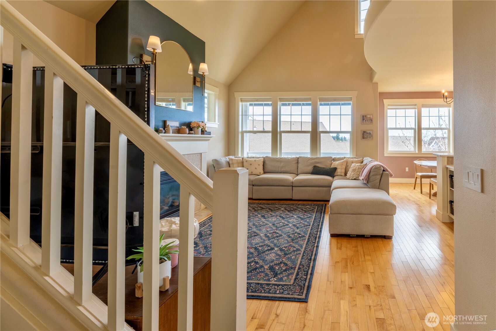 71 Craftsman Court Sequim, WA 98382 - Photo 19 of 33 a living room with furniture and a floor to ceiling window