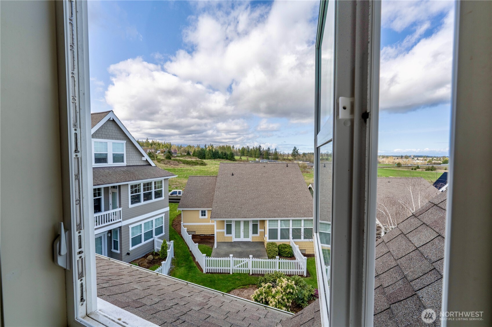 71 Craftsman Court Sequim, WA 98382 - Photo 23 of 33 a view of buildings from the balcony