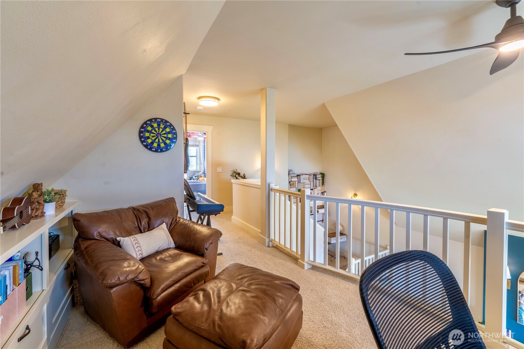 71 Craftsman Court Sequim, WA 98382 - Photo 24 of 33 a living room with furniture and a wooden floor