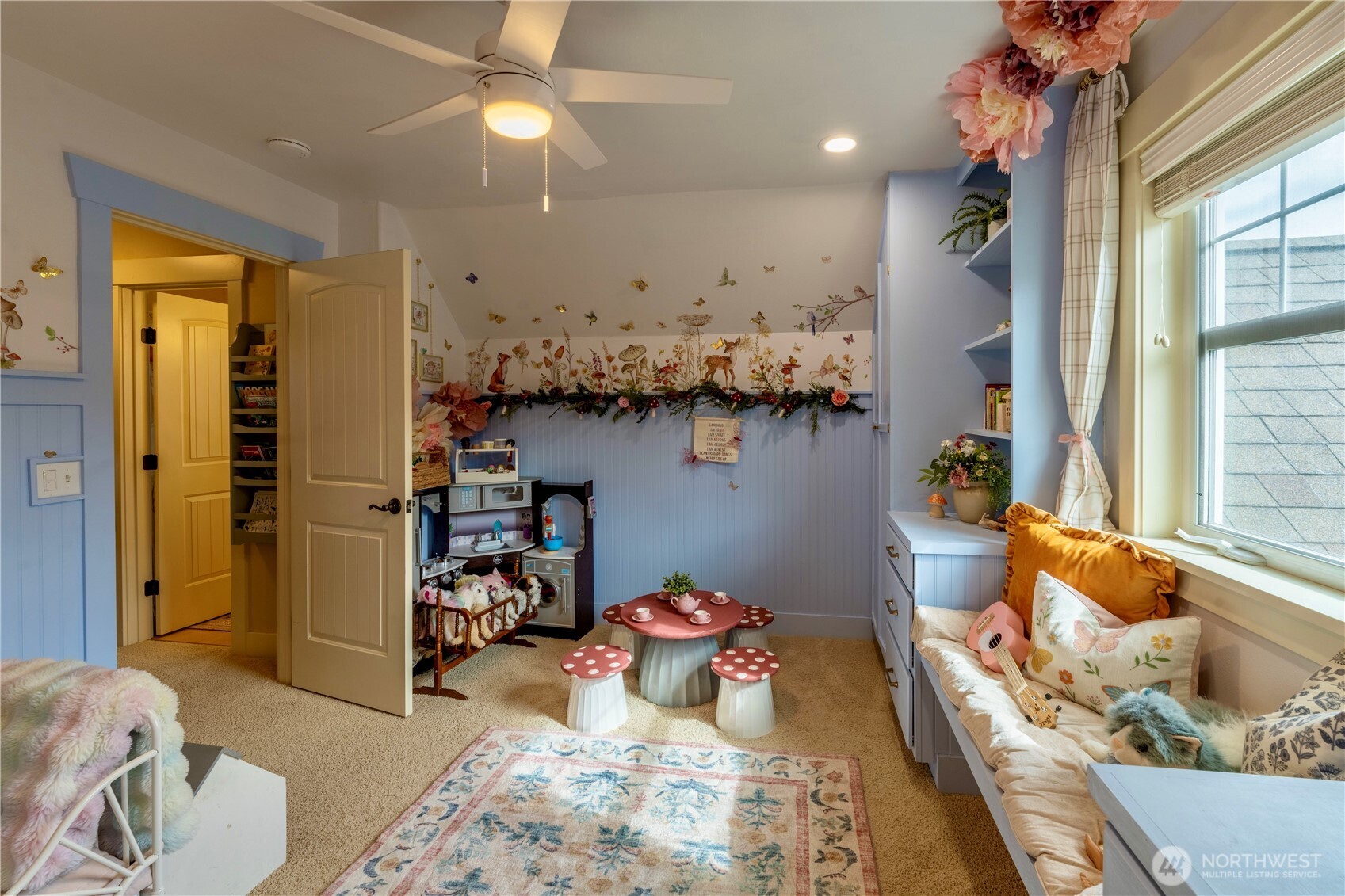 71 Craftsman Court Sequim, WA 98382 - Photo 26 of 33 a living room with furniture and a chandelier