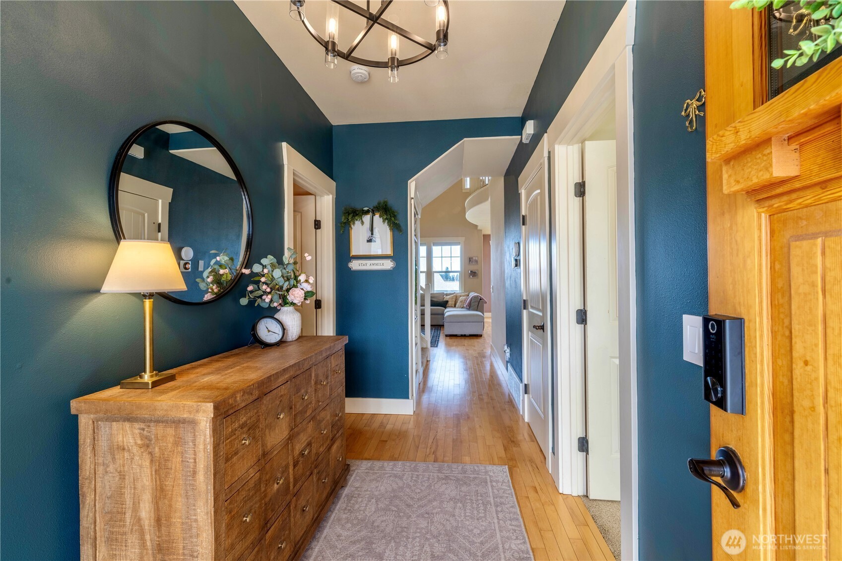 71 Craftsman Court Sequim, WA 98382 - Photo 3 of 33 a view of a hallway to a livingroom and a dinning room with furniture