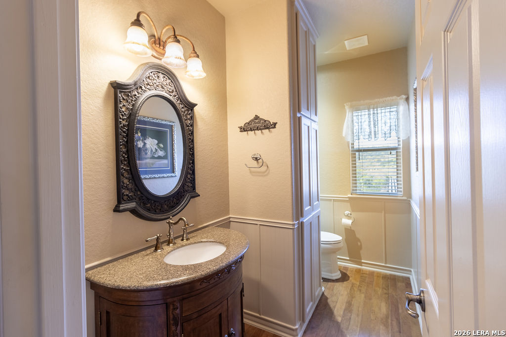 198 Echo Falls Road Comfort, TX 78013 - Photo 20 of 28 a bathroom with a sink and a mirror