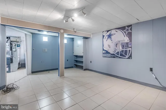 a view of a hallway with cabinet