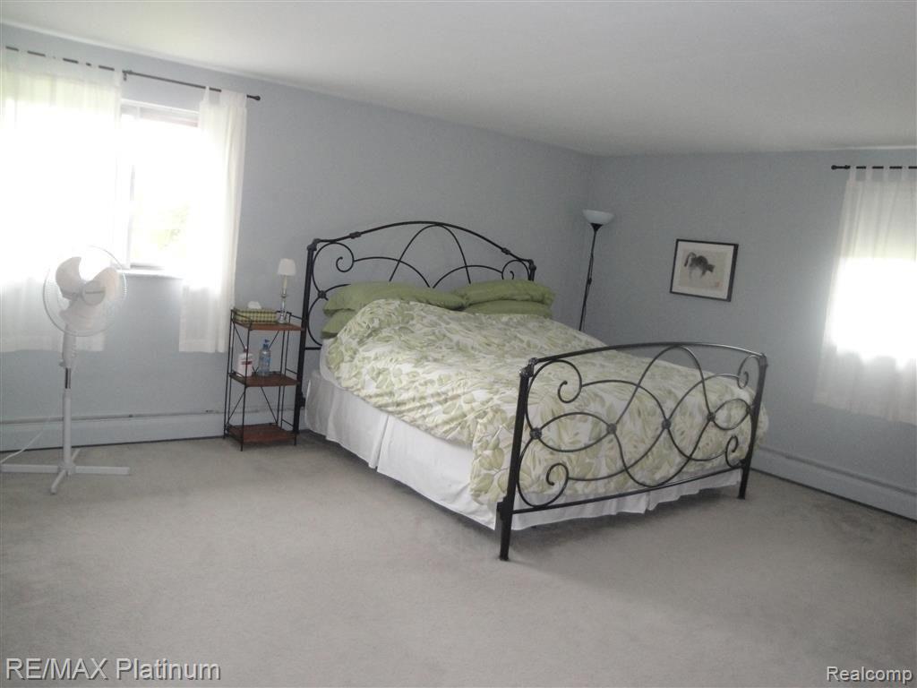 2080 Bowen Road Howell, MI 48855 - Photo 21 of 25 Spacious Master Bedroom