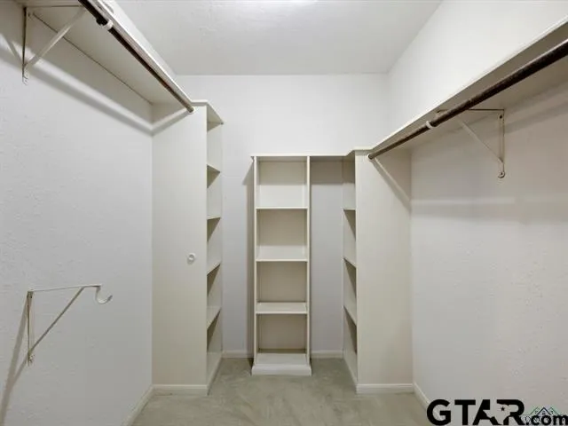 a room with walk in closet