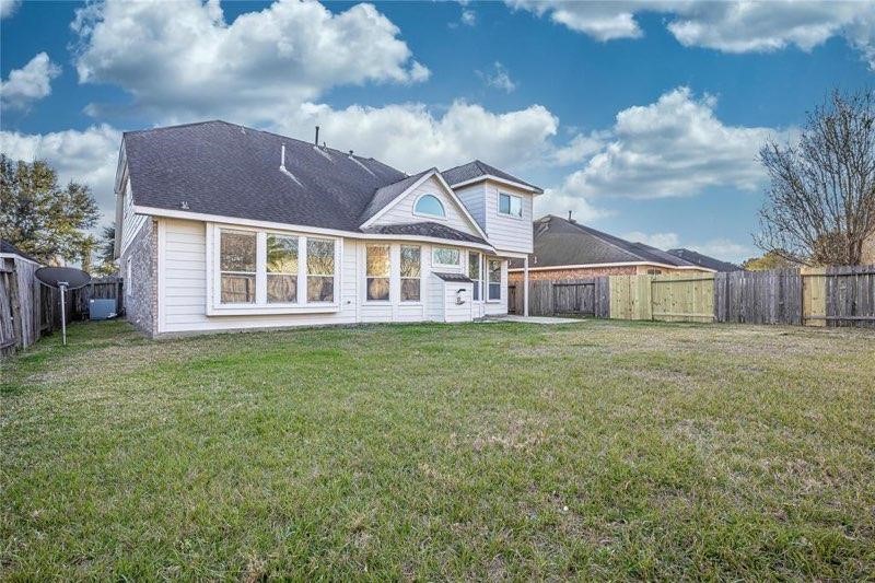 7635 Golden Thistle Lane Cypress, TX 77433 - Photo 15 of 15 a front view of a house with garden