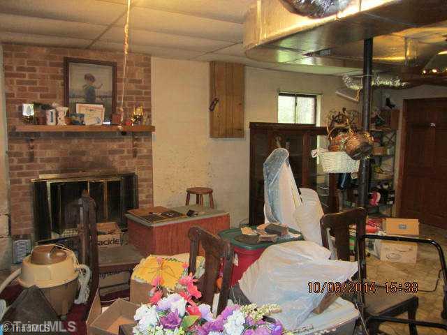211 Country Club Road Mount Airy, NC 27030 - Photo 13 of 16 Den/Family/Great Room. Den area in basement was finished at one time and could be easily updated
