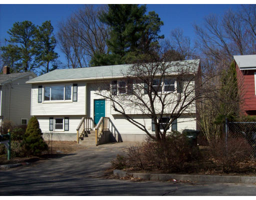 184 Lamont Street Springfield, MA 01119 - Photo 1 of 5 a view of a house with a yard