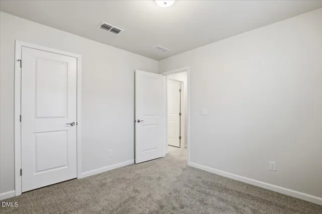 a view of a workspace with furniture