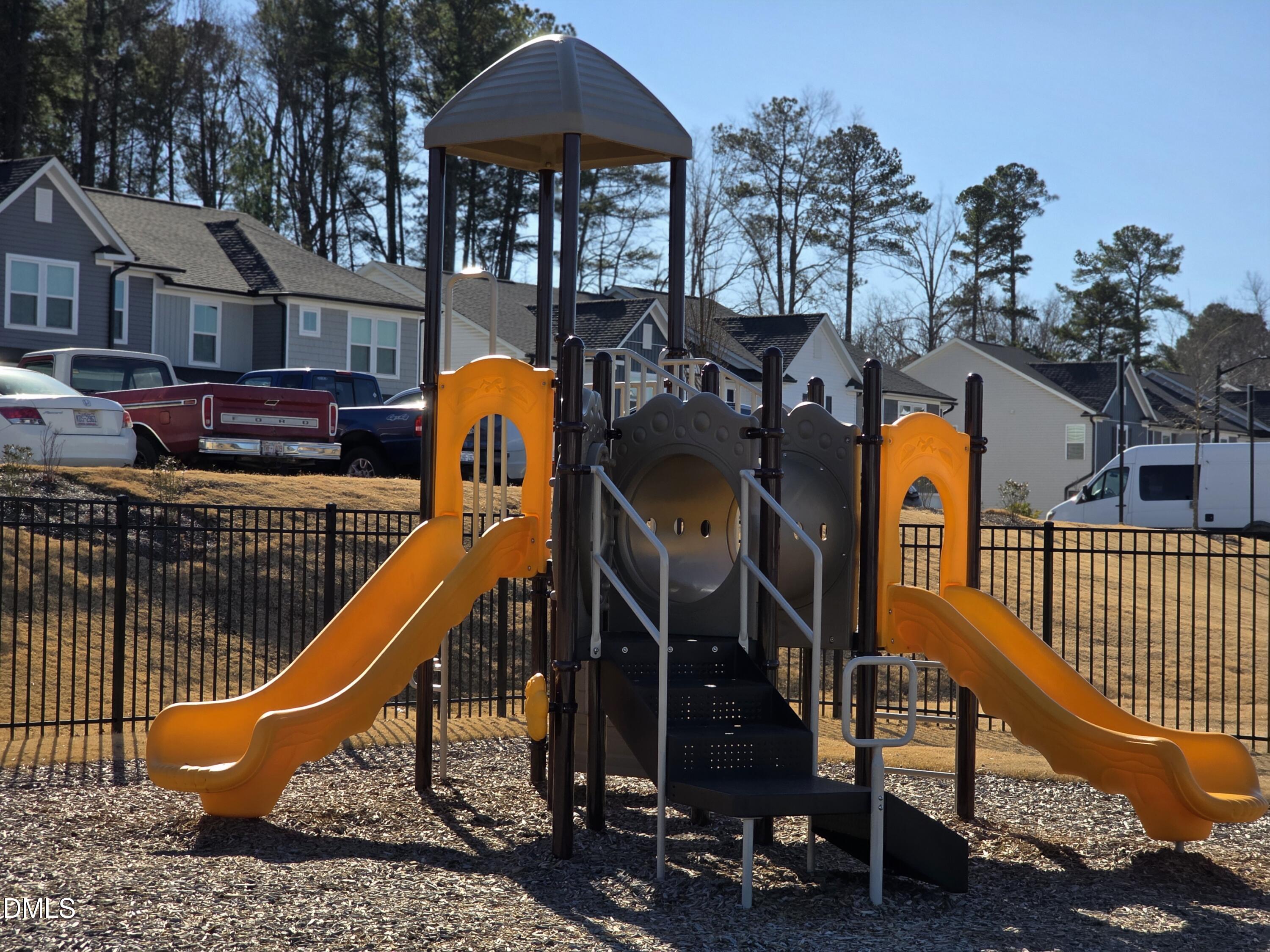 4025 Kidd Place Durham, NC 27703 - Photo 32 of 37 a view of a house with a slide